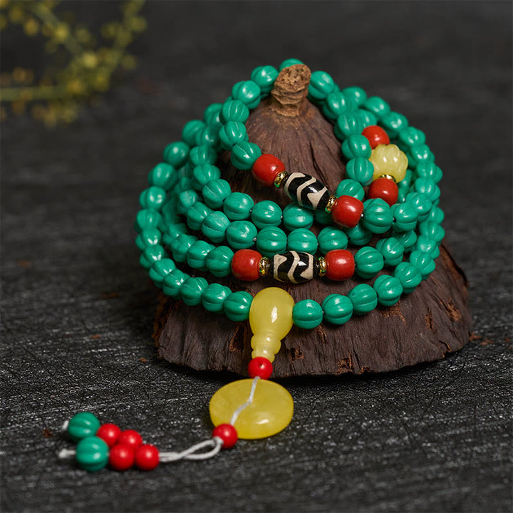 Buddha Stones Tybetańskie koraliki 108 turkusowych koralików dyniowych Dzi Bead Mala do pozytywnego myślenia - image 1