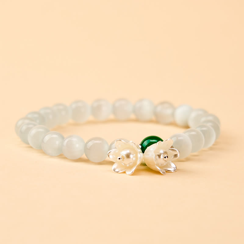 Buddha Stones Bransoletka z okrągłymi koralikami w kolorze białym z motywem konwalii, 8 mm - image 1