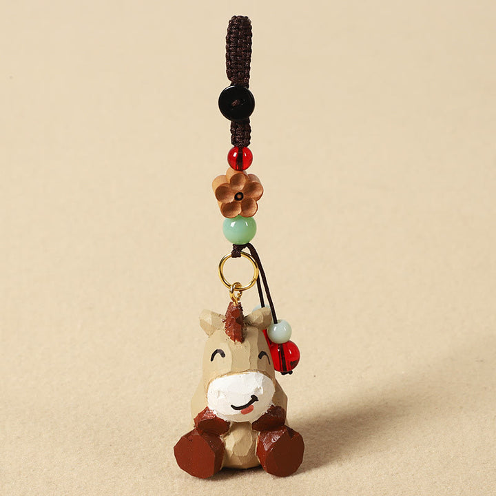 Buddha Stones Chiński breloczek z grawerunkiem z drewna lipowego i kwiatem śliwy, spokojem i bezpieczeństwem , Om Mani Padme Hum - Koń 4 cm (kolor, kształt i rozmiar mogą się różnić) - Kwiat śliwy - image 1
