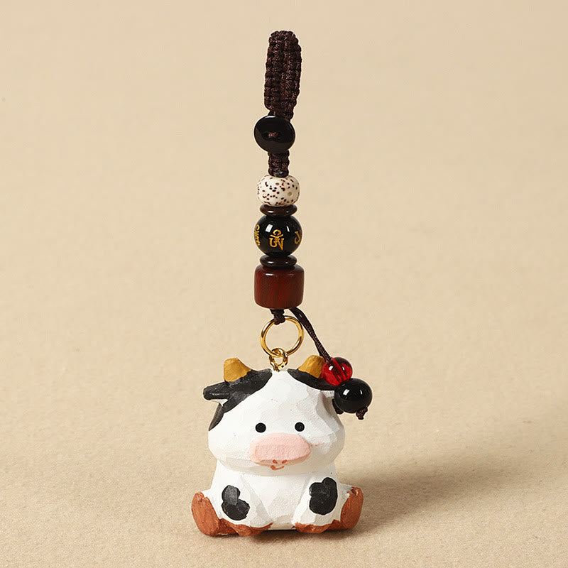 Buddha Stones Chiński breloczek z grawerunkiem z drewna lipowego i kwiatem śliwy, spokojem i bezpieczeństwem , Om Mani Padme Hum - Wół 4 cm (kolor, kształt i rozmiar mogą się różnić) - Om Mani Padme Hum - image 10