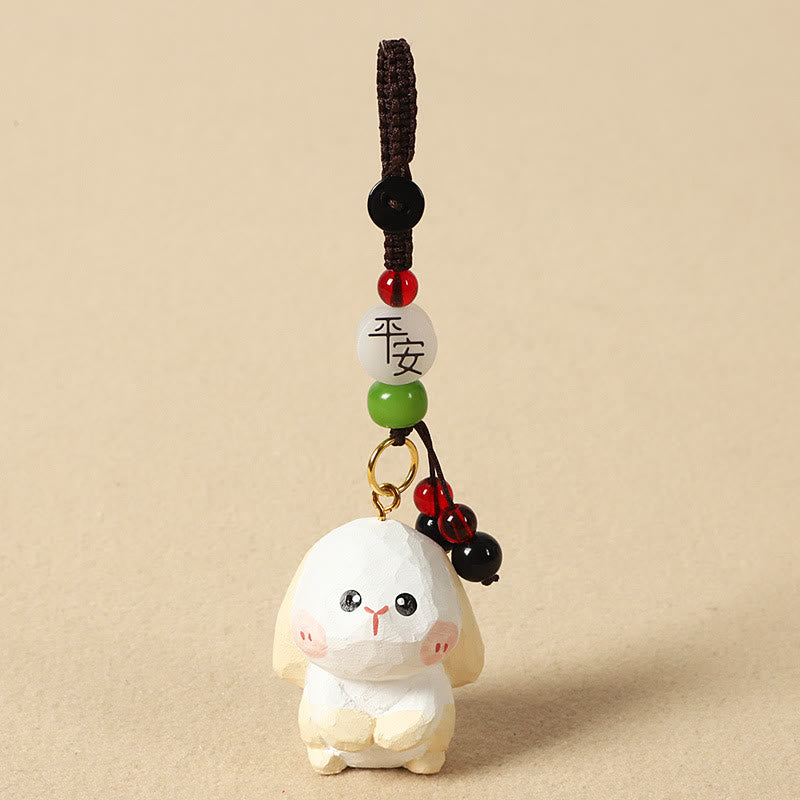 Buddha Stones Chiński breloczek z grawerunkiem z drewna lipowego i kwiatem śliwy, spokojem i bezpieczeństwem , Om Mani Padme Hum - Królik 4 cm (kolor, kształt i rozmiar mogą się różnić) - Pokój i bezpieczeństwo - image 18