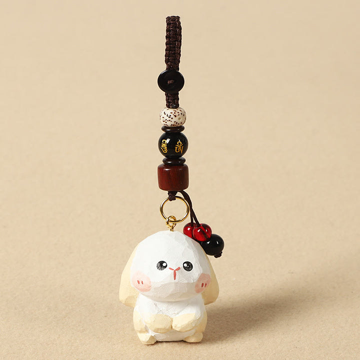 Buddha Stones Chiński breloczek z grawerunkiem z drewna lipowego i kwiatem śliwy, spokojem i bezpieczeństwem , Om Mani Padme Hum - Królik 4 cm (kolor, kształt i rozmiar mogą się różnić) - Om Mani Padme Hum - image 16
