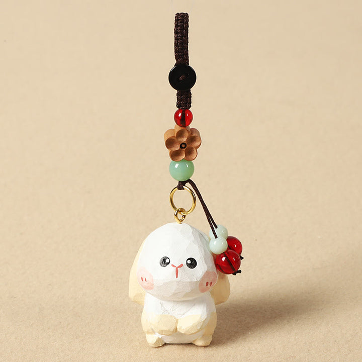 Buddha Stones Chiński breloczek z grawerunkiem z drewna lipowego i kwiatem śliwy, spokojem i bezpieczeństwem , Om Mani Padme Hum - Królik 4 cm (kolor, kształt i rozmiar mogą się różnić) - Kwiat śliwy - image 17