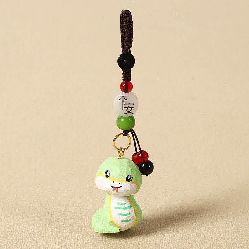 Buddha Stones Chiński breloczek z grawerunkiem z drewna lipowego i kwiatem śliwy, spokojem i bezpieczeństwem , Om Mani Padme Hum - Wąż 4 cm (kolor, kształt i rozmiar mogą się różnić) - Pokój i bezpieczeństwo - image 25