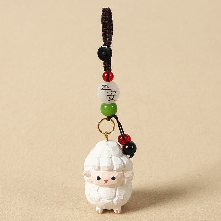 Buddha Stones Chiński breloczek z grawerunkiem z drewna lipowego i kwiatem śliwy, spokojem i bezpieczeństwem , Om Mani Padme Hum - Koza 4 cm (kolor, kształt i rozmiar mogą się różnić) - Pokój i bezpieczeństwo - image 28