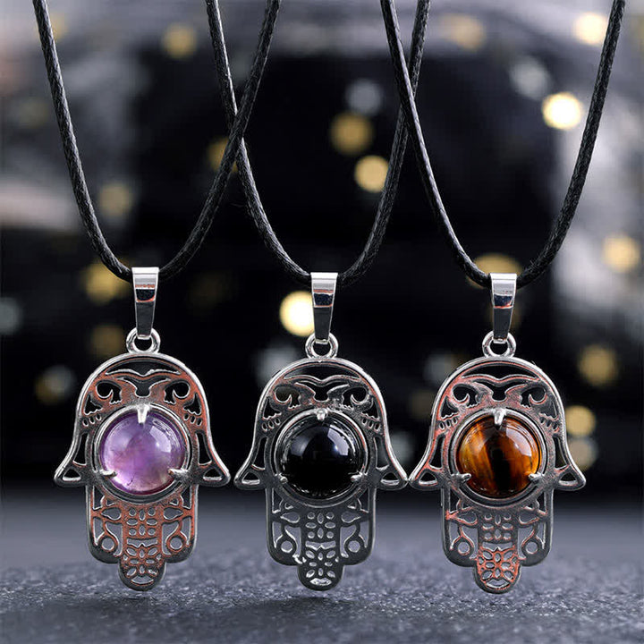 Buddha Stones Naszyjnik z kryształu z naturalnego czarnego obsydianu i palmy Hamsa - image 0