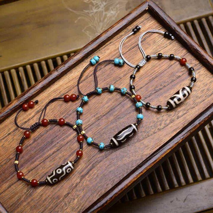 Buddha Stones Bransoletka ochronna z plecionej liny z agatu południowego Dzi Beads South Red - image 0