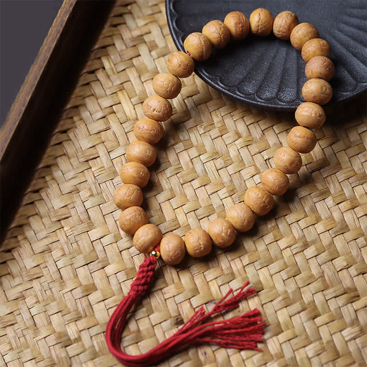 Buddha Stones Tybetańska grawerowana mala na nadgarstek z frędzlami i okiem feniksa - Bodhi Oka Feniksa (Ochrona ♥ Mądrość) - image 0