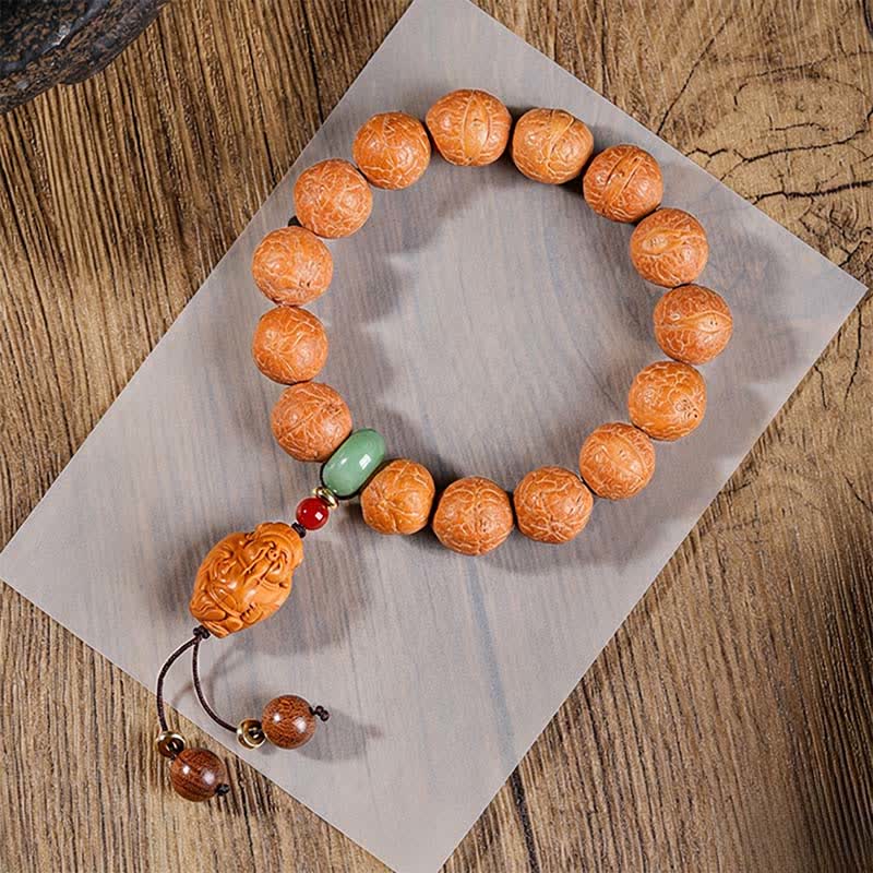 Buddha Stones Ręcznie rzeźbiona etniczna mala na nadgarstek z motywem mądrości Bodhi i oka feniksa - Mala na nadgarstek Phoenix Eye - 15 mm - Oko Feniksa Bodhi (Ochrona ♥Mądrość) - image 1