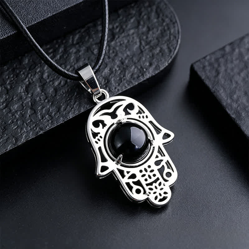 Buddha Stones Naszyjnik z kryształu z naturalnego czarnego obsydianu i palmy Hamsa - Naturalny czarny obsydian (kolor może się różnić) - image 1