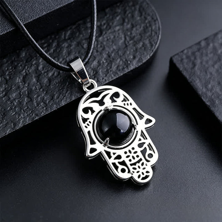 Buddha Stones Naszyjnik z kryształu z naturalnego czarnego obsydianu i palmy Hamsa - Naturalny czarny obsydian (kolor może się różnić) - image 1