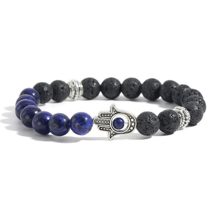 Buddha Stones Ręcznie wykonana okrągła bransoletka z ochroną dłoni Hamsa z lawy wulkanicznej - Imitacja lapisu i skały lawowej - image 13