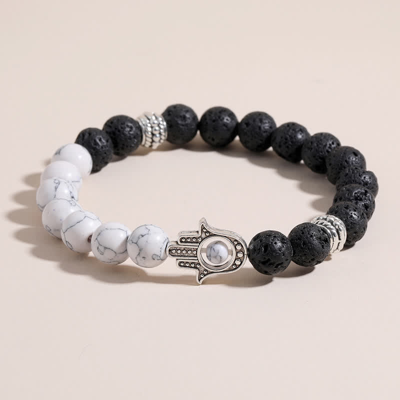 Buddha Stones Ręcznie wykonana okrągła bransoletka z ochroną dłoni Hamsa z lawy wulkanicznej - image 0
