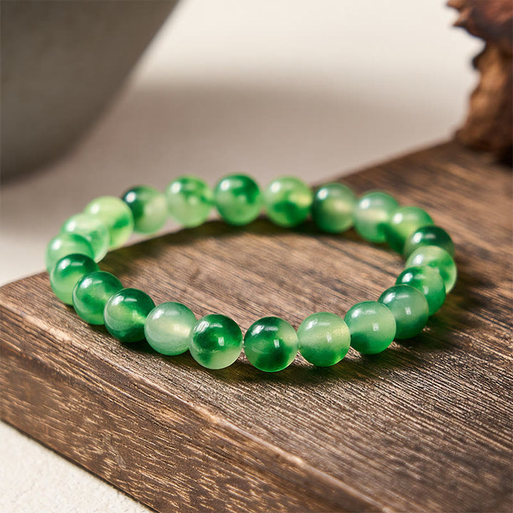Buddha Stones Bransoletka z okrągłych koralików z białego chalcedonu, uzdrawiająca, zielona, ​​z pływającym kwiatem - 8 mm - Biały chalcedon (harmonia♥pozytywna) - image 0
