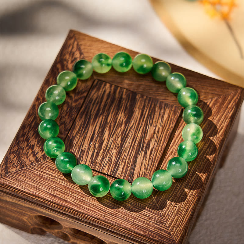Buddha Stones Bransoletka z okrągłych koralików z białego chalcedonu, uzdrawiająca, zielona, ​​z pływającym kwiatem - image 1