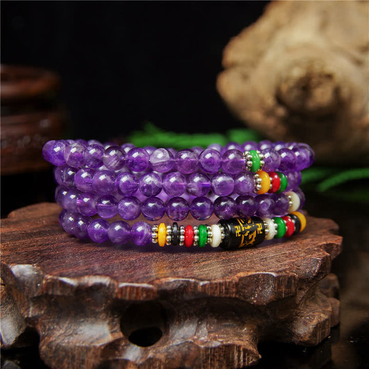 Buddha Stones Ametystowa modlitwa o czystość Om Mani Padme Hum 108 koralików Mala - image 1
