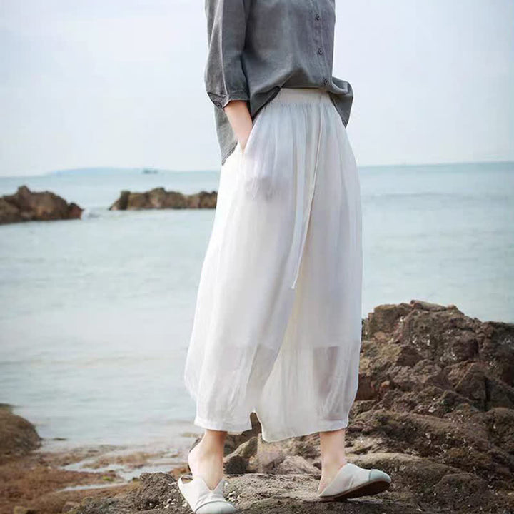 Buddha Stones Letnie, swobodne spodnie capri w stylu boho ze ściągaczem i kieszeniami. Szerokie nogawki. - image 52
