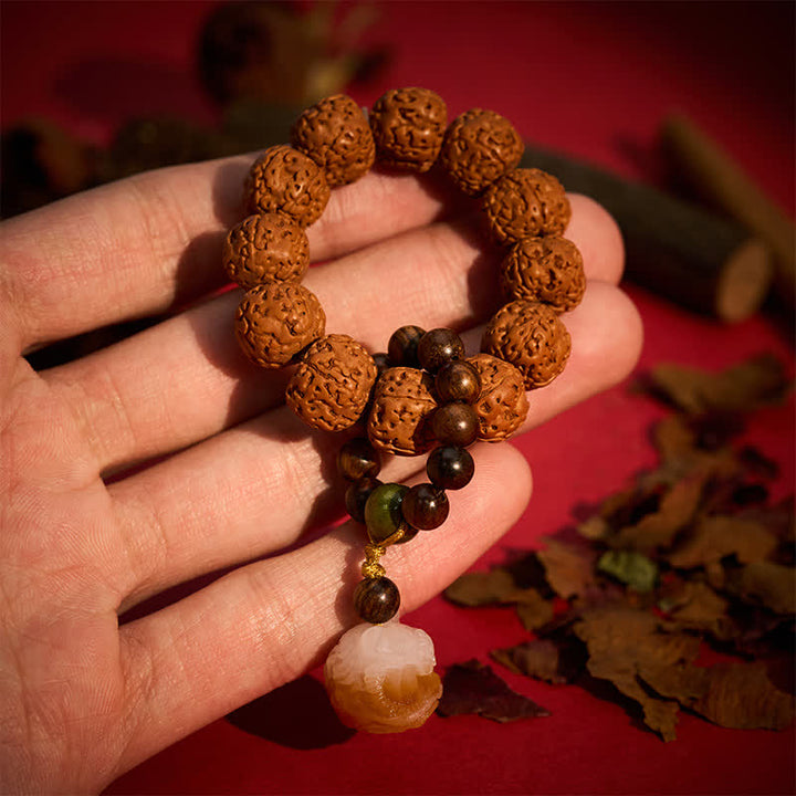 Buddha Stones Wisiorek z lwem Bodhi z grillowanym węglem drzewnym z nasionami Vajra, siła, dotyk, medytacja, koraliki, dekoracje - Nasiono Wadżry (Siła ♥ Ochrona) - image 0