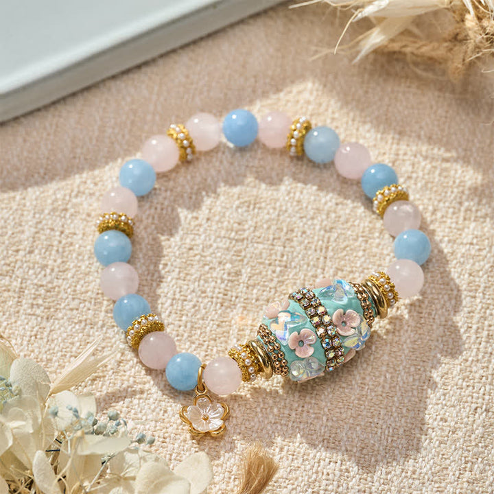 Buddha Stones Bransoletka z okrągłymi koralikami w kształcie kwiatu z różowego kwarcu, niebieskiego chalcedonu i miedzi - image 1