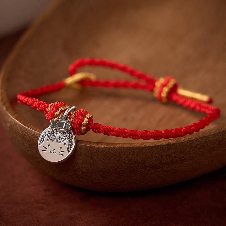 Buddha Stones Srebrna bransoletka pleciona z czerwonym i czarnym sznurkiem, 925, kotek jedzący rybę - image 1