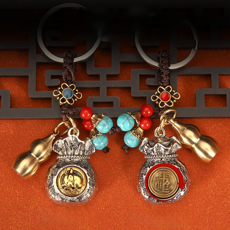 Buddha Stones Breloczki do kluczy z wirującą torebką z symbolem chińskiego zodiaku i fortuny - image 10