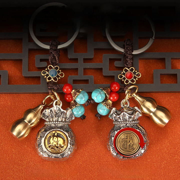 Buddha Stones Breloczki do kluczy z wirującą torebką z symbolem chińskiego zodiaku i fortuny - image 10