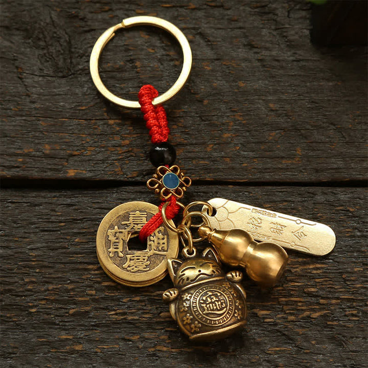 Buddha Stones Mosiężne chińskie monety z wizerunkiem kota szczęścia, breloczki do kluczy z symbolem bogactwa - Monety Red Cord - image 0