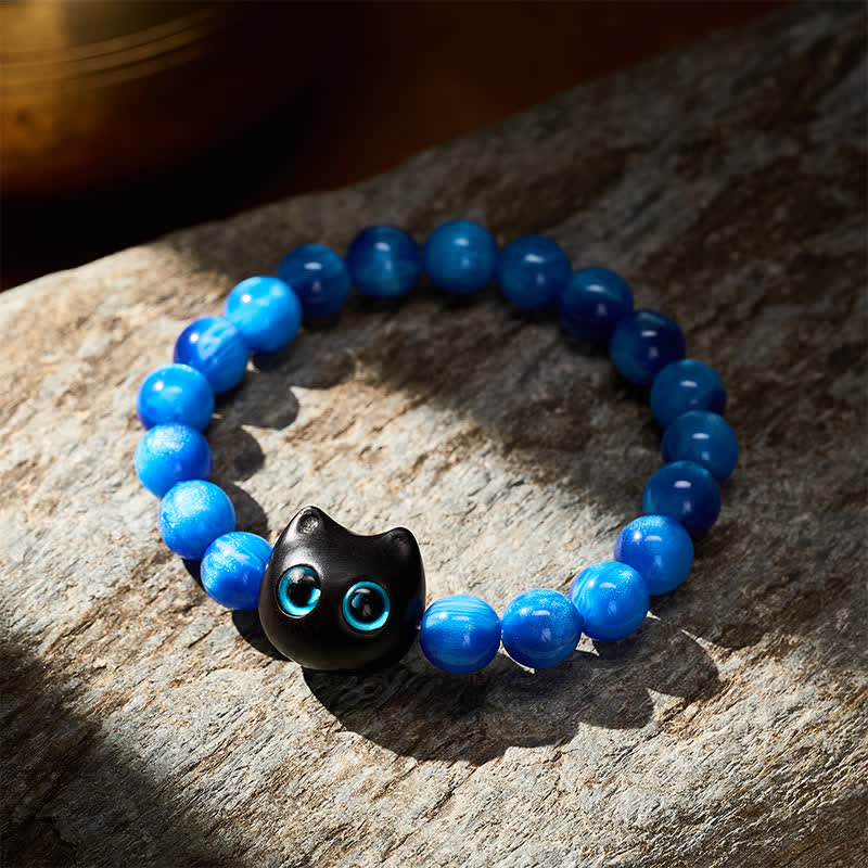 Buddha Stones Bransoletka z niebieskimi koralikami z żywicy i drewna hebanowego w kształcie kota - image 12
