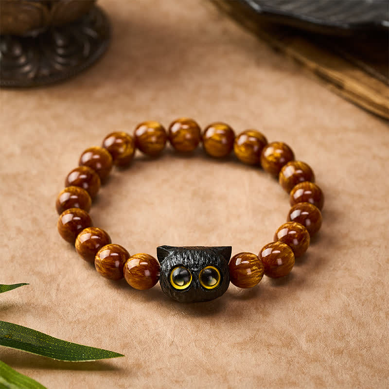 Buddha Stones Bransoletka z kotem i koralikami z żywicy hebanowej w kolorze żółtym - image 1