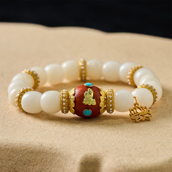 Buddha Stones Bransoletka z koralików błogosławieństwa z białymi nasionami Bodhi, grawerowanym, pomarańczowym, owalnym wisiorkiem z lotosu w stylu tybetańskim - image 1