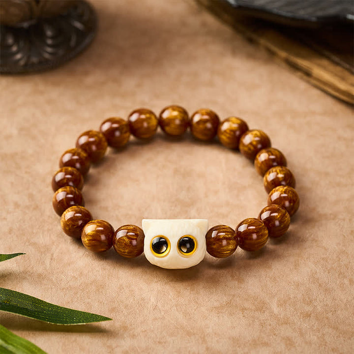 Buddha Stones Bransoletka z żółtymi koralikami z żywicy i kości słoniowej z motywem mądrości kota - 10 mm (obwód nadgarstka: 6,3-6,7 cala / 16-17 cm) - image 0