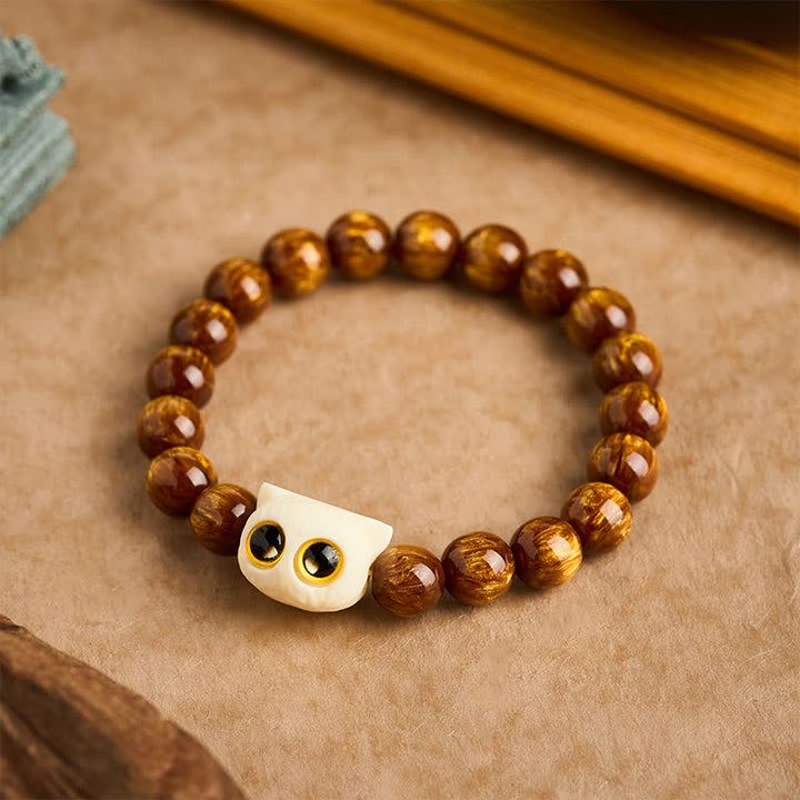 Buddha Stones Bransoletka z żółtymi koralikami z żywicy i kości słoniowej z motywem mądrości kota - image 1
