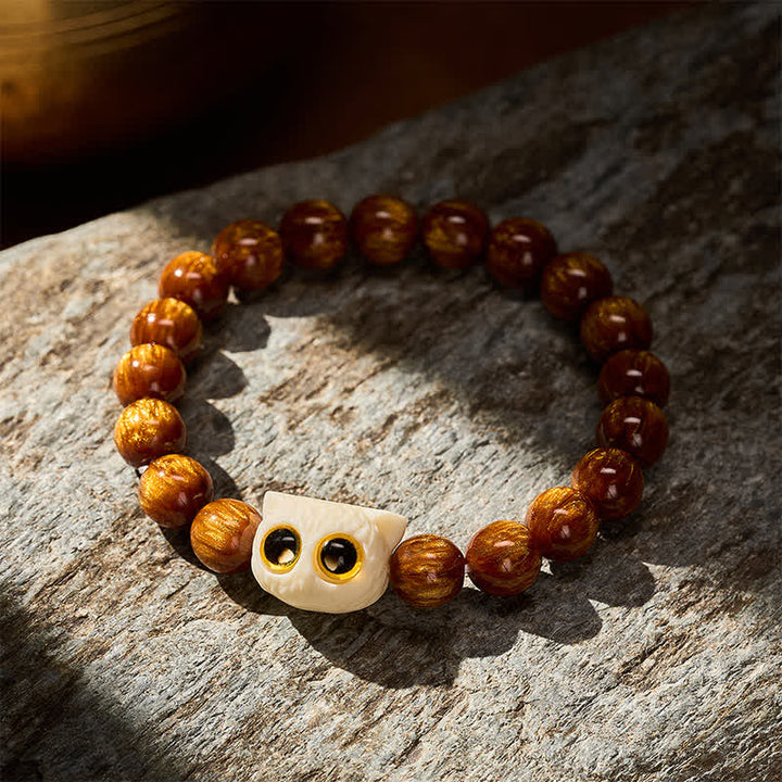 Buddha Stones Bransoletka z żółtymi koralikami z żywicy i kości słoniowej z motywem mądrości kota - image 3