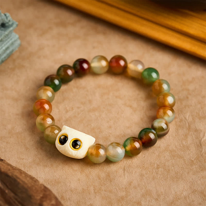 Buddha Stones Bransoletka z pawiego agatu i kości słoniowej z motywem kota i odwagi - 10 mm (obwód nadgarstka: 6,3-6,7 cala / 16-17 cm) - image 0