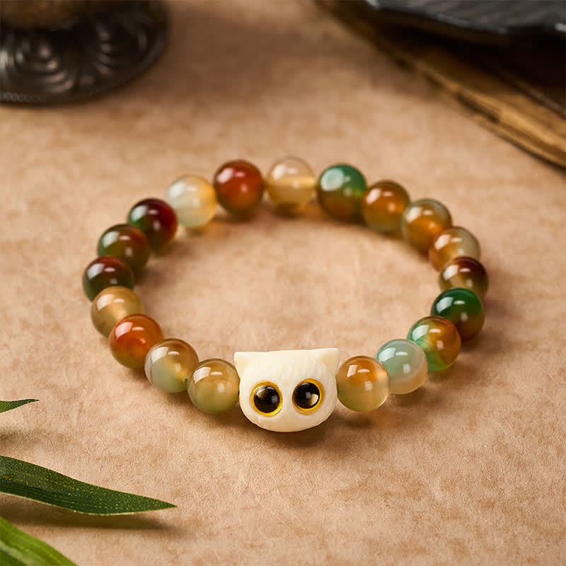 Buddha Stones Bransoletka z pawiego agatu i kości słoniowej z motywem kota i odwagi - image 1