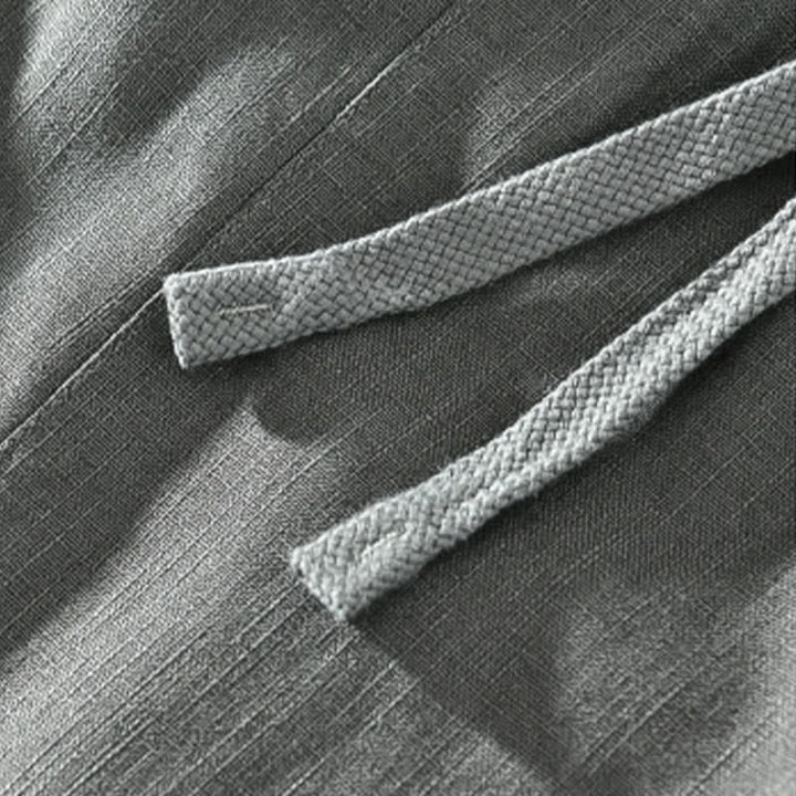 Buddha Stones Wiosenne letnie, swobodne, minimalistyczne spodnie męskie ze ściągaczem i solidnymi nogawkami do kostek. Spodnie zwężane z kieszeniami. - image 1