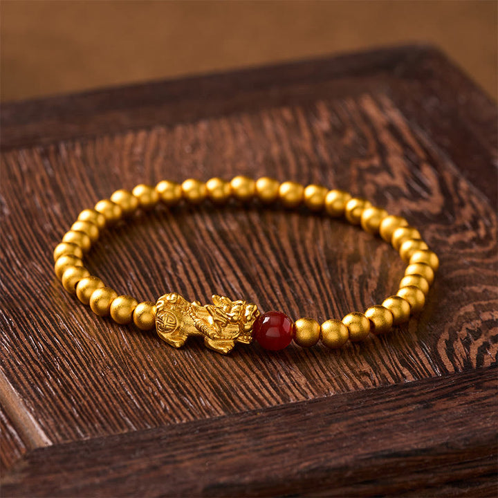 Buddha Stones Bransoletka z okrągłych koralików Pi Xiu Wealth z pozłacanej miedzi i czerwonego agatu - image 1