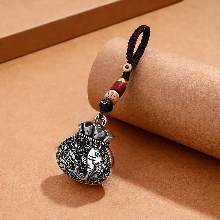 Buddha Stones Antyczne miedziane breloczki do kluczy z woreczkami na pieniądze i pustym wzorem ryby Koi - Breloczki z rybą Koi - image 0