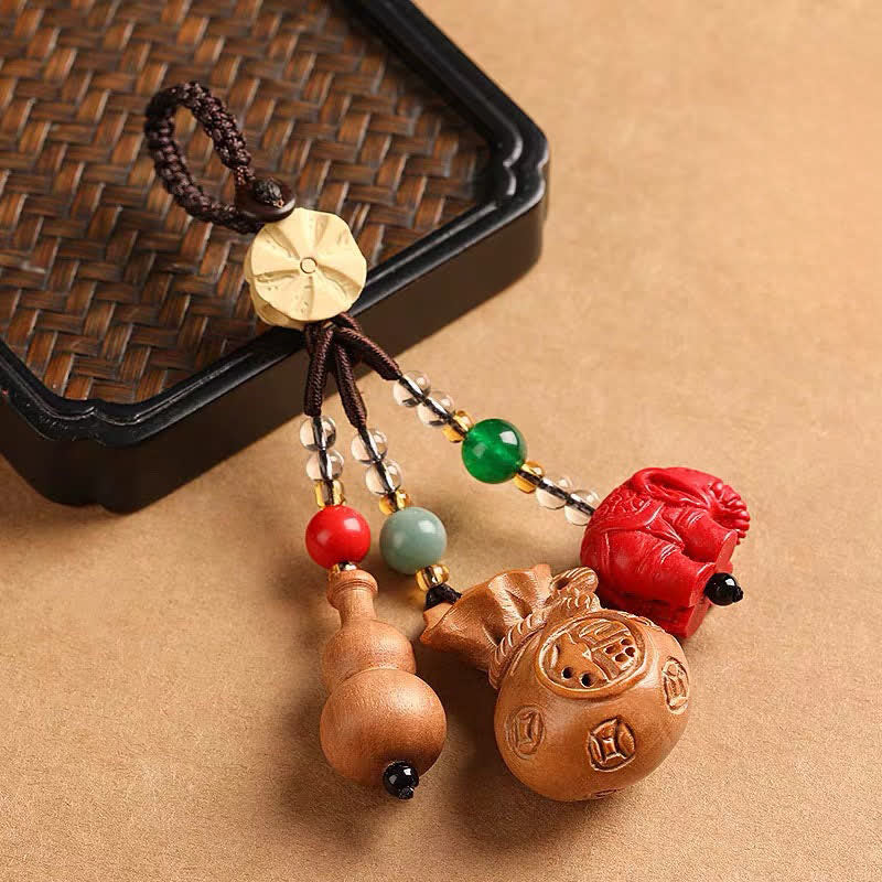 Buddha Stones Breloczki do kluczy z motywem brzoskwiniowego drewna Fu, sakiewki na pieniądze, szczęśliwy cynobrowy słoń, lotos, tykwa - image 1