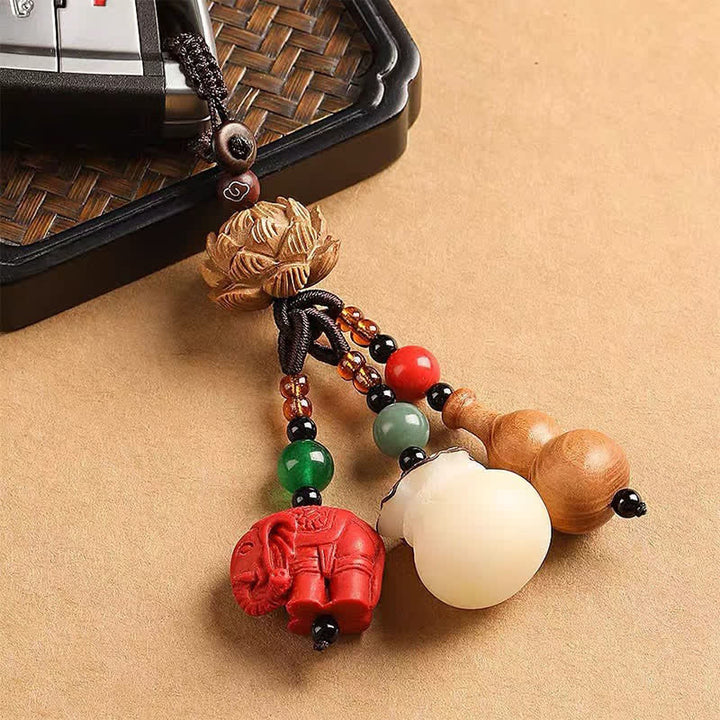 Buddha Stones Breloczki do kluczy z motywem brzoskwiniowego drewna Fu, sakiewki na pieniądze, szczęśliwy cynobrowy słoń, lotos, tykwa - image 15