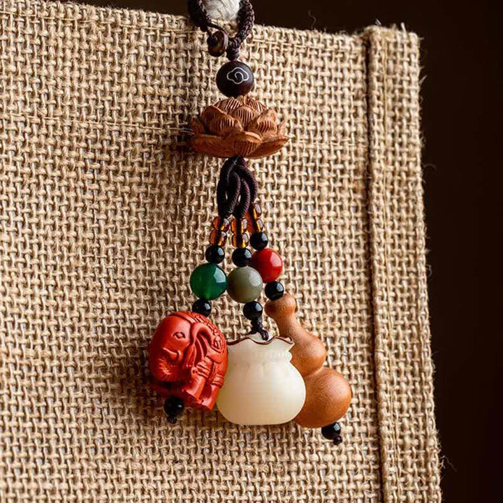Buddha Stones Breloczki do kluczy z motywem brzoskwiniowego drewna Fu, sakiewki na pieniądze, szczęśliwy cynobrowy słoń, lotos, tykwa - image 18