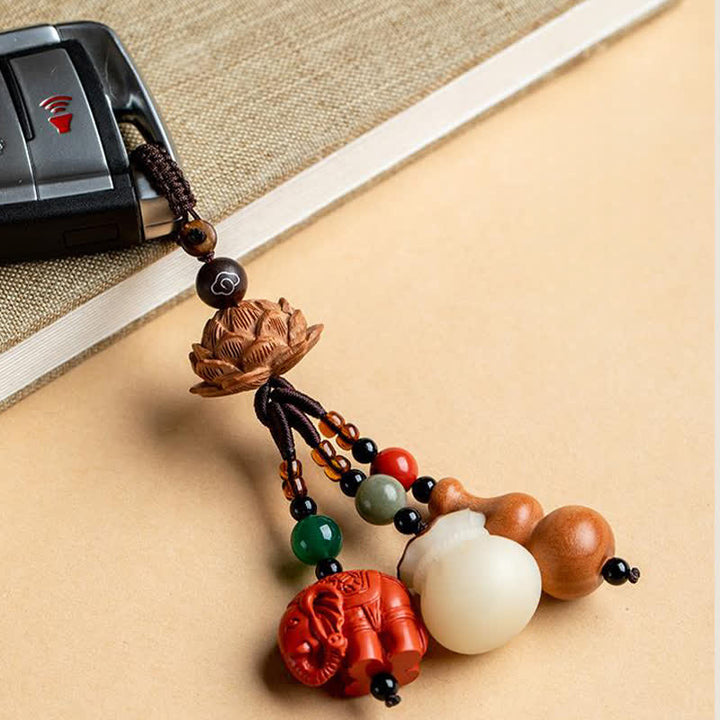 Buddha Stones Breloczki do kluczy z motywem brzoskwiniowego drewna Fu, sakiewki na pieniądze, szczęśliwy cynobrowy słoń, lotos, tykwa - image 16