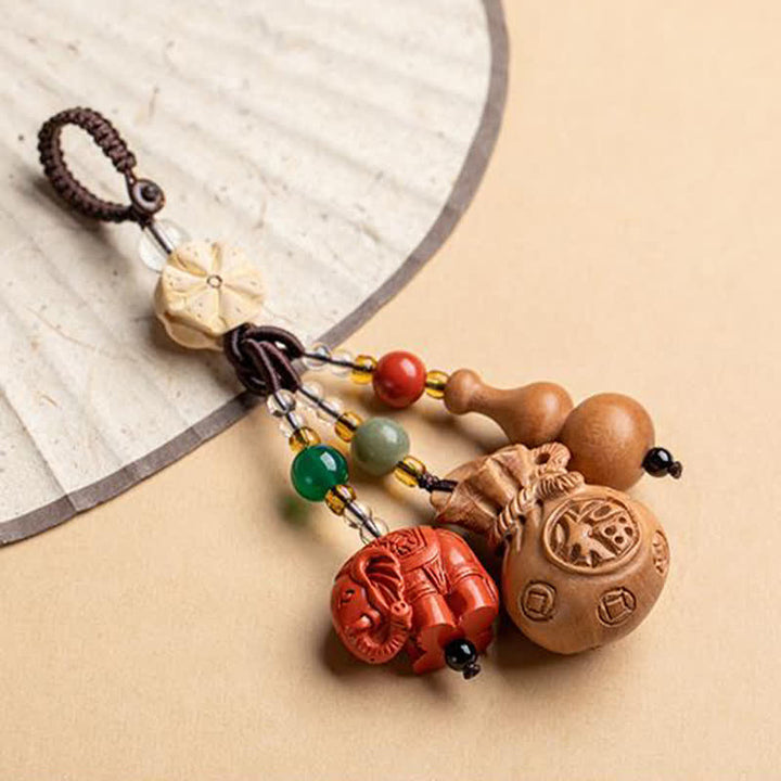 Buddha Stones Breloczki do kluczy z motywem brzoskwiniowego drewna Fu, sakiewki na pieniądze, szczęśliwy cynobrowy słoń, lotos, tykwa - image 19