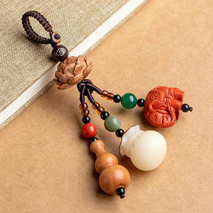 Buddha Stones Breloczki do kluczy z motywem brzoskwiniowego drewna Fu, sakiewki na pieniądze, szczęśliwy cynobrowy słoń, lotos, tykwa - image 20