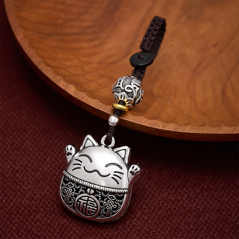 Buddha Stones Grawerowane miedziane breloki z postacią Fu Lucky Cat w oplocie Balance - Srebrzysty Kot Szczęścia - image 0
