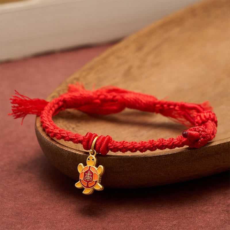 Buddha Stones Bransoletka z żółwiem, pozłacaną miedzią i czerwonym sznurkiem Balance Tibet - image 1