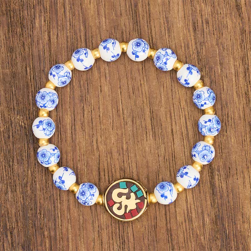 Buddha Stones Bransoletka z koralików OM Compassion z niebieskiej i białej porcelany z miedzi - image 2