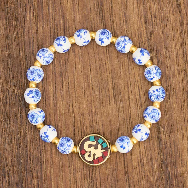 Buddha Stones Bransoletka z koralików OM Compassion z niebieskiej i białej porcelany z miedzi - image 2