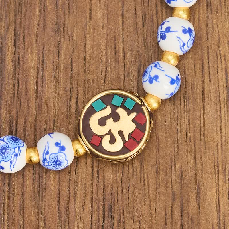 Buddha Stones Bransoletka z koralików OM Compassion z niebieskiej i białej porcelany z miedzi - image 4