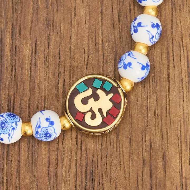 Buddha Stones Bransoletka z koralików OM Compassion z niebieskiej i białej porcelany z miedzi - image 4